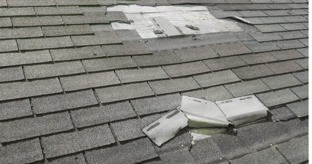 examples of wind related roof damage from Storm of record